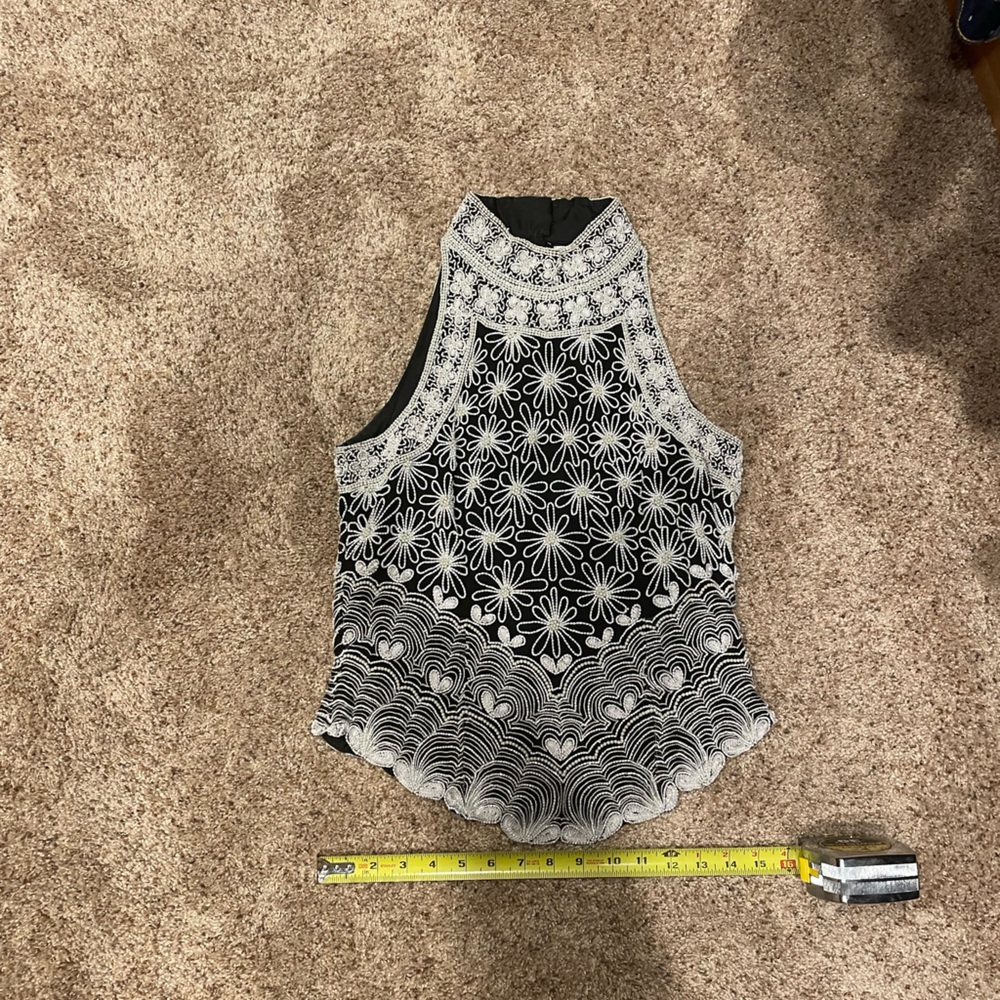 Small beaded sleeveless evening top